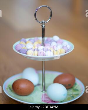 Mini Easter Eggs on a cake stand Stock Photo
