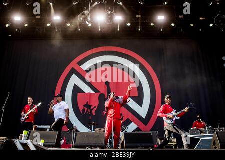 Odense, Denmark. 28th, June 2018. The American rap group Prophets of Rage performs a live concert during the Danish music festival Tinderbox 2018 in Odense. Here (L-R) bass player Tim Commerford is seen live on stage with rappers Chuck D, B-Real and guitarist Tom Morello. (Photo credit: Gonzales Photo - Lasse Lagoni). Stock Photo