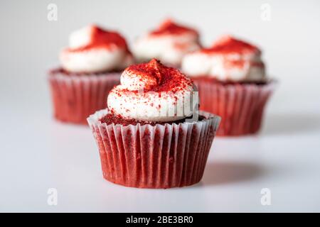 Group of Red Velvet Cupcakes on White Background Horizontal Stock Photo