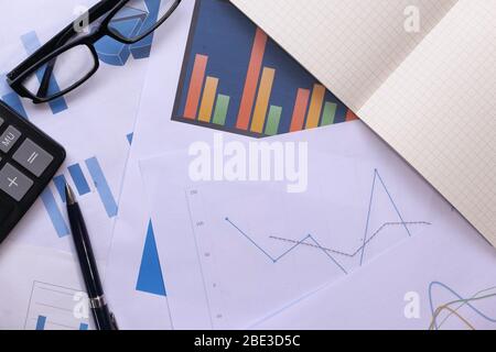 Close up of financial chart and graph on paper. Stock Photo