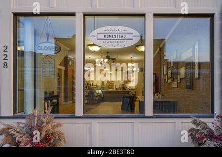 Fort MacLeod, Alberta, Canada – April 09, 2020:  Store front window of the Homestead Bakery in downtown Stock Photo