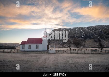 Beautiful small red church in northern Iceland Stock Photo