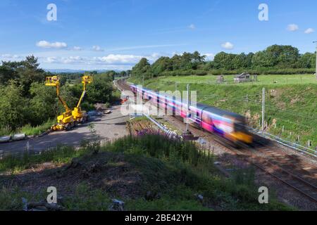 First Transpennine Express Siemens Desiro class 350 electric train at speed on the west coast mainline with motion blur.  Firstgroup train Stock Photo