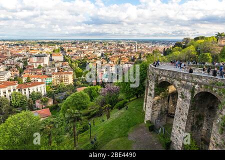 Aerial panorama of Bergamo city, Lombardy, Italy. Picturesque spring view from one of the viewpoints of upper city of Bergamo. Pedestrian street Via S Stock Photo