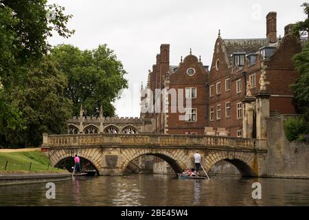 Punting on the Cam River by the Kitchen Bridge and the Bridge of Sighs at St John's College in Cambridge, England, United Kingdom. Punting on the Cam River by the Kitchen Bridge and the Bridge of Sighs at St John's College in Cambridge, England, United Kingdom.
