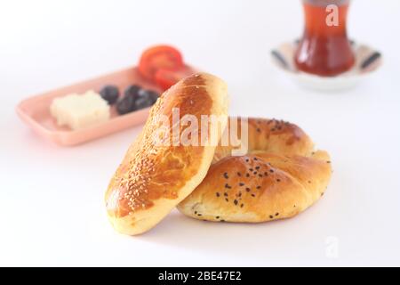 Turkish Pastry Pogaca and tea on white background. Traditional Bakery Stock Photo