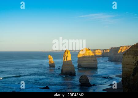 Twelve Apostles limestone pinnacles that are a major tourist attraction on Great Ocean Road in Victoria Australia Stock Photo