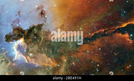 Colored nebula and open cluster of stars in the universe. Elements of ...