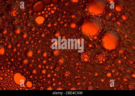 red orange water bubbles abstract background close up Stock Photo