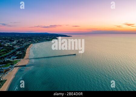 Beautiful sunset over Frankston waterfront and the pier - aerial view with copy space Stock Photo