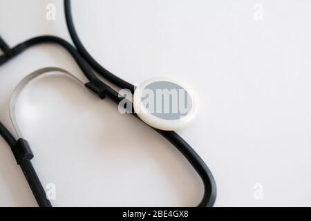 Black stethoscope isolated on white background. Healthcare Stock Photo
