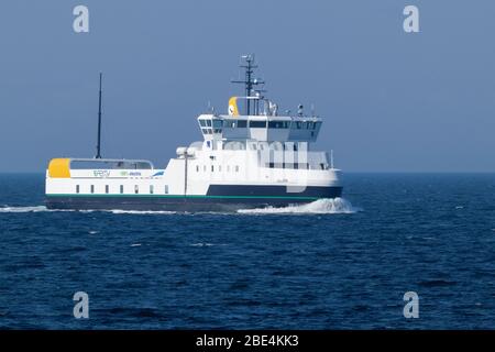 The 100 percent electric propelled domestic car and passenger ferry ELLEN passes Skjoldnæs on the northernmost tip of the Danish island Ærø. Stock Photo