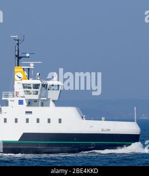 The 100 percent electric propelled domestic car and passenger ferry ELLEN passes Skjoldnæs on the northernmost tip of the Danish island Ærø. Stock Photo