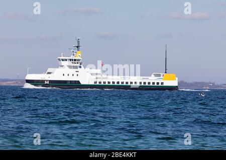 The 100 percent electric propelled domestic car and passenger ferry ELLEN passes Skjoldnæs on the northernmost tip of the Danish island Ærø. Stock Photo