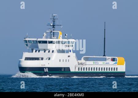 The 100 percent electric propelled domestic car and passenger ferry ELLEN passes Skjoldnæs on the northernmost tip of the Danish island Ærø. Stock Photo