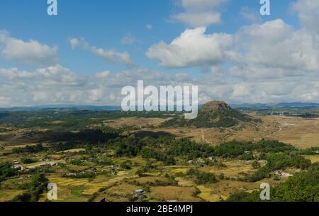 amazing landscape in the countryside with a stream flowing by and a vista of the clouds and the mountains Stock Photo