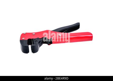 red black wire stripper, close-up isolate Stock Photo