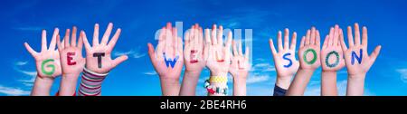 Children Hands Building Word Get Well Soon, Blue Sky Stock Photo