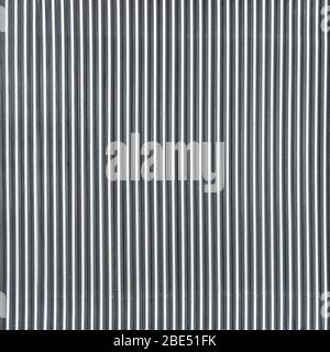 Background, small homogeneous repeating mesh-type metallic structure for creative and other uses, close up Stock Photo