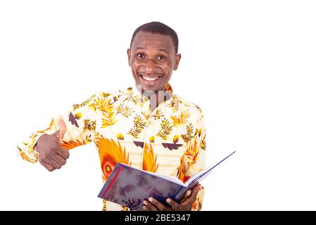 young happy businessman holding a document, offering a handshake and smiling at the camera. Stock Photo