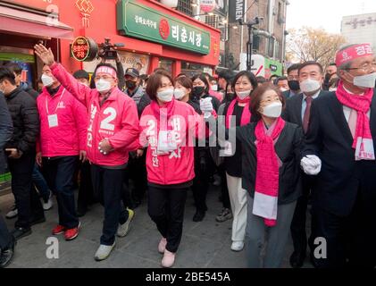 Seoul, South Korea. 11th Apr, 2020. Hwang Kyo-Ahn and Choi Ji-Young, Apr 11, 2020 : Wearing masks to prevent COVID-19 coronavirus infection, Hwang Kyo-Ahn (3rd L), chairman of South Korea's main opposition United Future Party (UFP) and his wife Choi Ji-Young (4th L) attend his election campaign for the April 15 parliamentary elections in his electoral district of Jongno Ward in Seoul, South Korea. Hwang's headband reads, 'Economic Renewal'. Hwang is running for the election in Jongno, a symbolic constituency in Korean politics where influences in politics are elected. Lee Nak-Yon, former prime Stock Photo