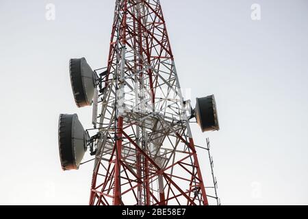 Cellular Base Station or Base Transceiver Station. Telecommunication tower. Wireless Communication Antenna Transmitter. 3G, 4G and 5G Cell Site. Stock Photo