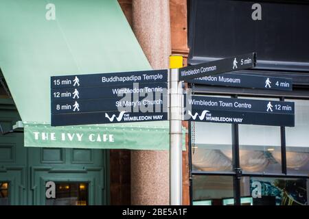 Wimbledon Postcode. Sign LONDON- MARCH, 2019: Sign post in Wimbledon Village directing to the ...