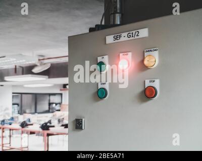 Close up of electric control panel in a factory with indication light Stock Photo