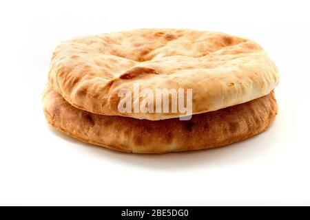Two pita bread isolated on white background. Plain bread. Stock Photo