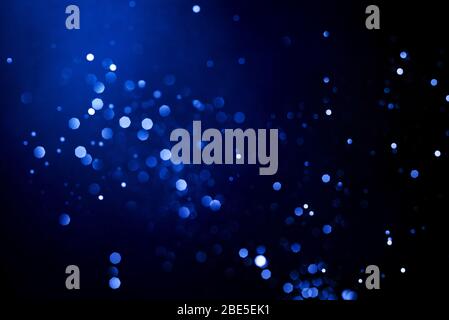 Abstract background with glowing blue particles. Stock Photo