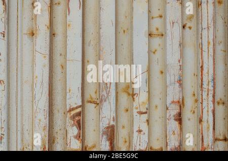 Beige steel wall with rust Stock Photo