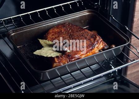 Grilled pork ribs. Juicy meat on the grill. Cooking meat. Stock Photo