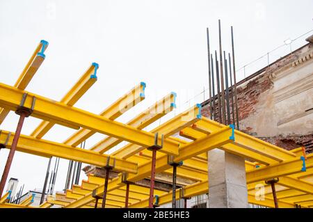 Equipment in the form of wooden beams for fastening formwork in monolithic construction of buildings Stock Photo