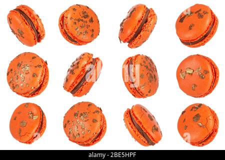 Macro photo of french orange macaroon isolated on white background, clipping path. Stock Photo