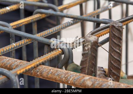 Reinforcing steel bars for building new concrete structures. Base for pouring concrete. Concrete construction. Stock Photo