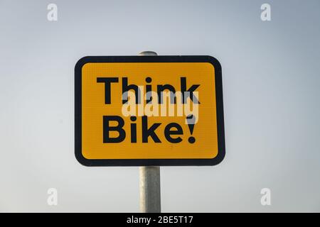 Sign reminding motorists to be aware of motorcyclists Stock Photo