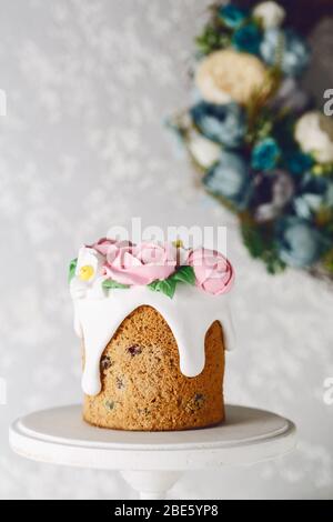 Easter cake on the stand on grey background. Holiday background, copy space Stock Photo
