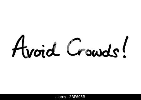 Avoid Crowds! handwritten on a white background. Stock Photo