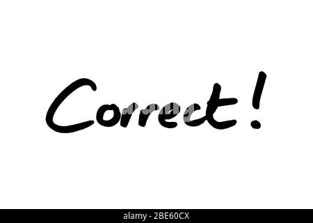 The word Correct! handwritten on a white background. Stock Photo