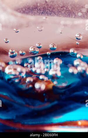 Abstract texture of bubbles captured in glass with ink Stock Photo