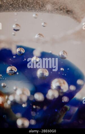 Abstract texture of bubbles captured in glass Stock Photo