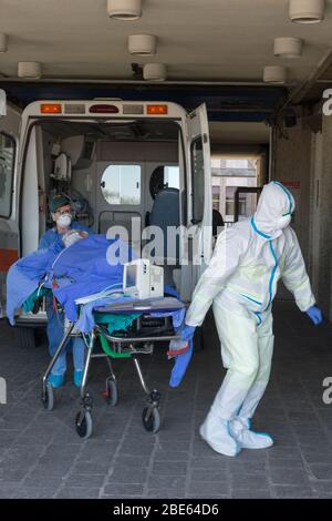 Campobasso,Molise Region,Italy:A patient, suspected covid 19, is rushed to the emergency room of the Cardarelli hospital in Campobasso. Stock Photo