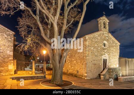 night cityscape at the place of ancient Cathedral of San Giusto in Trieste, Italy Stock Photo