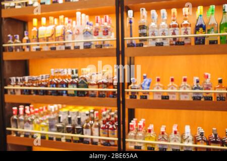 Background Blurred Defocused Beers are cooling in fridge, freezer or refrigerator shelf. Defocused Blurry Night life, Night Club, Bar, Pub, Store or G Stock Photo