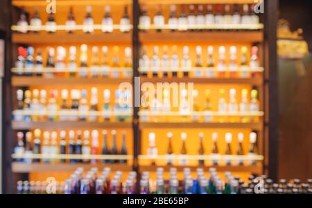 Background Blurred Defocused Beers are cooling in fridge, freezer or refrigerator shelf. Defocused Blurry Night life, Night Club, Bar, Pub, Store or G Stock Photo