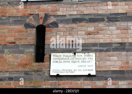 Pieve (rural parish Church) of San Donato in Polenta. Bertinoro, Italy. Facade detail – epigraph. Stock Photo