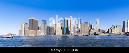 Panorama view of New York city Lower Manhattan skyscraper skyline building cityscape from Brooklyn New York State USA. Stock Photo