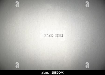 Inscription fake news is printed with an old typewriter Stock Photo