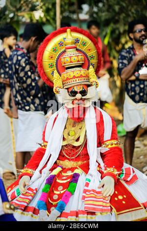 dancers of kathakali dancer,theyyam,thira,folk dancers,celebration,kerala festival,indian festival dancers,dance form india, Stock Photo