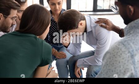 Diverse young people participate in group psychological therapy Stock Photo